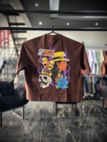 CAMISETAS G TRIP SID MARROM ESTAMPA ROSA/CAVEIRA