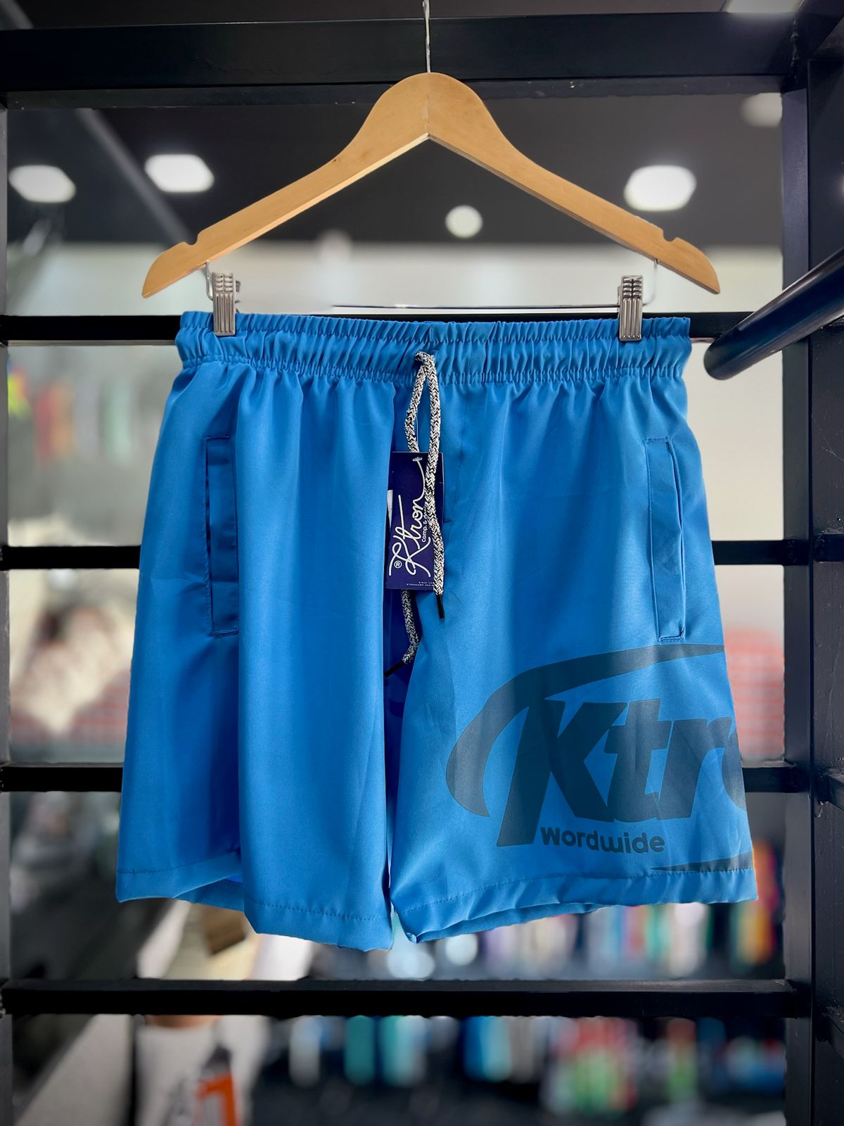 WhatsApp Image 2026-02-25 at 09.49.47 BERMUDA P MODA PRAIA K-TRON 2026 AZUL - Imagem 1